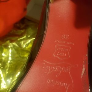 Christian Loubitin black heels